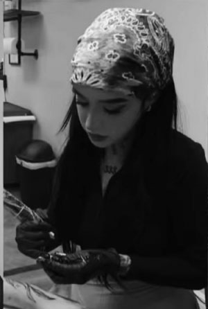 Rose Guzman, an experienced tattoo Artist at Crowes Ink tattoo studio in Bradenton, Manatee County